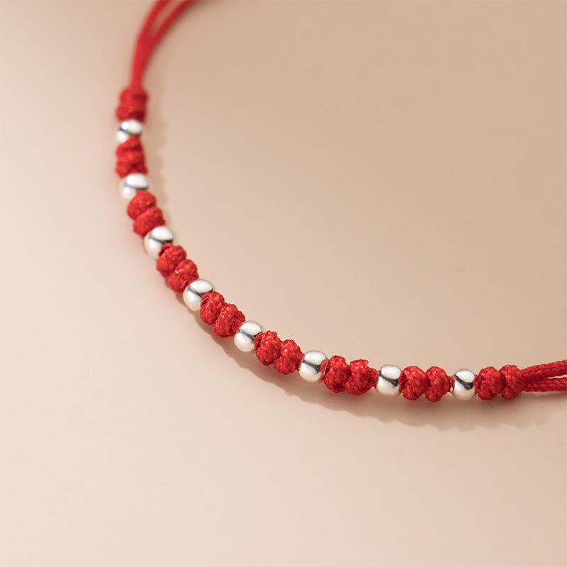 Braccialetto portafortuna regolabile con perline in argento sterling 925 e cordino rosso Buddha Stones - image 11