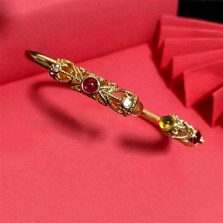 Bracciale rigido con motivo floreale Buddha Stones, zircone rosso, ambra e rame portafortuna - image 9