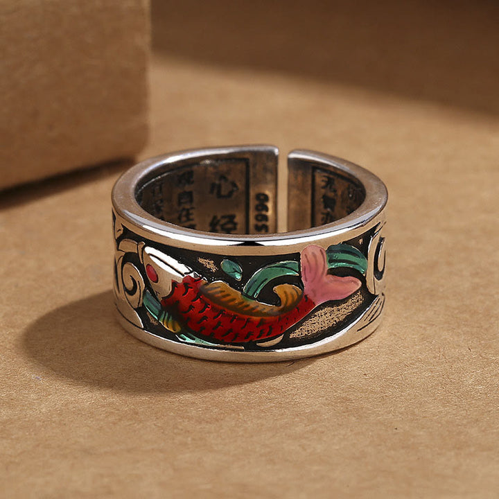 Anello di successo del Sutra del cuore del pesce koi in smalto blu Buddha Stones