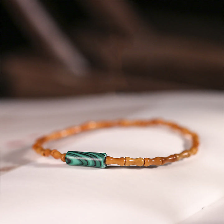 Bracciale della pace con noccioli di oliva ultra-fini Buddha Stones - Nocciolo di oliva e malachite (circonferenza del polso: 14-16 cm) - image 9