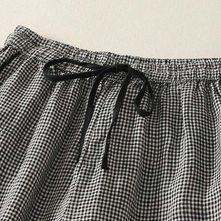 Pantaloni harem da donna in cotone e lino con coulisse e tasche, con motivo a Buddha Stones. - image 2