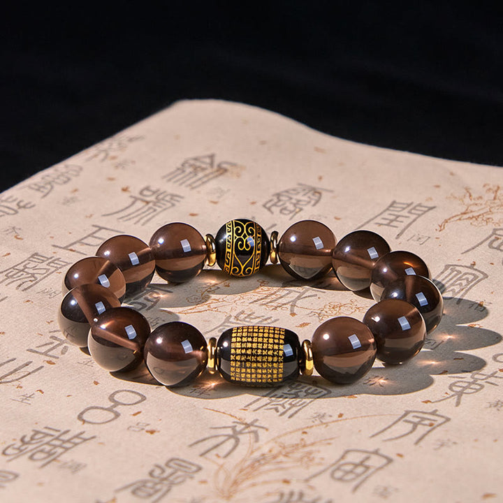 Braccialetto Buddha Stones Ice Obsidian con timbro oro in sanscrito e coraggio