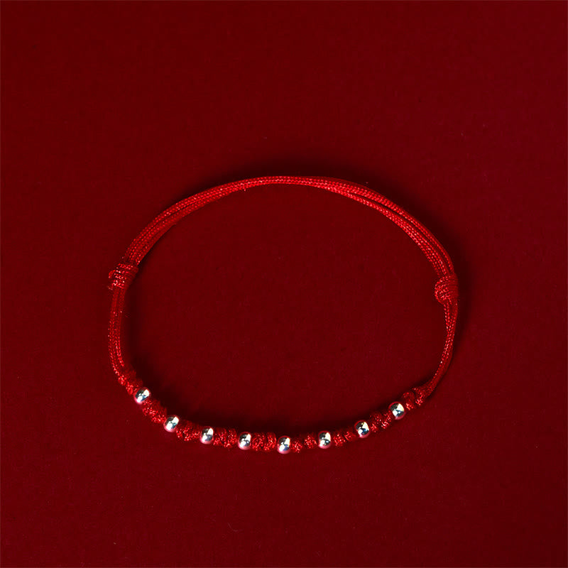 Braccialetto portafortuna regolabile con perline in argento sterling 925 e cordino rosso Buddha Stones - image 1