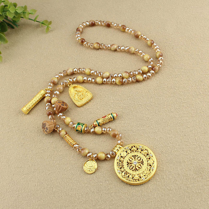 Collana con ciondolo in perle di occhio di tigre dorato, piastra rotonda tibetana con Buddha Stones e loto - image 9