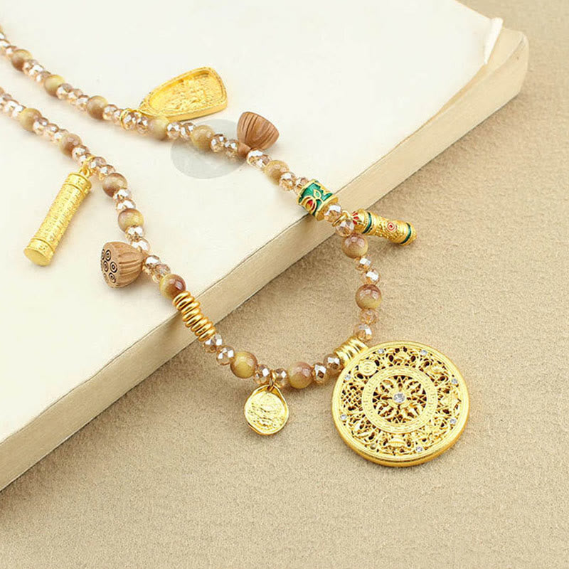 Collana con ciondolo in perle di occhio di tigre dorato, piastra rotonda tibetana con Buddha Stones e loto - image 2