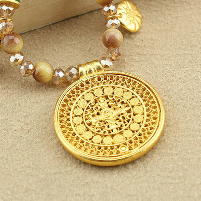 Collana con ciondolo in perle di occhio di tigre dorato, piastra rotonda tibetana con Buddha Stones e loto - image 13