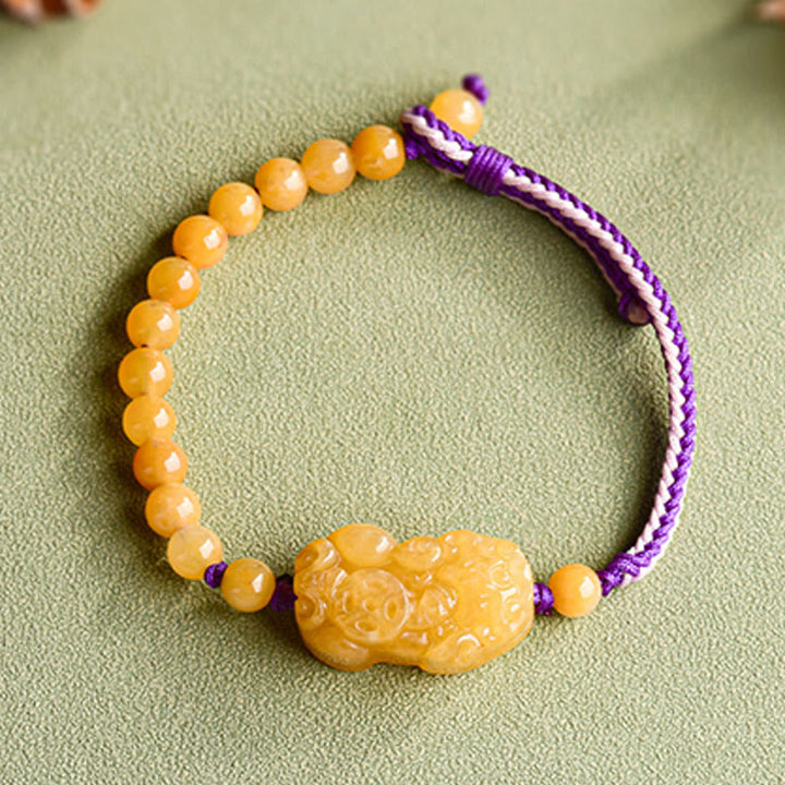 Braccialetto della ricchezza PiXiu con perle di giada di seta dorata e Buddha Stones - image 2