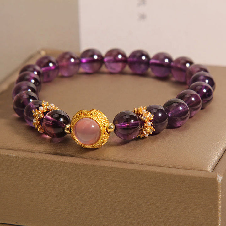 Braccialetto curativo con perle di quarzo fragola e ametista naturale Buddha Stones - image 2