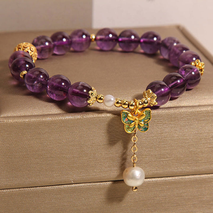 Braccialetto curativo con farfalla verde e ambra naturale in Buddha Stones - image 9