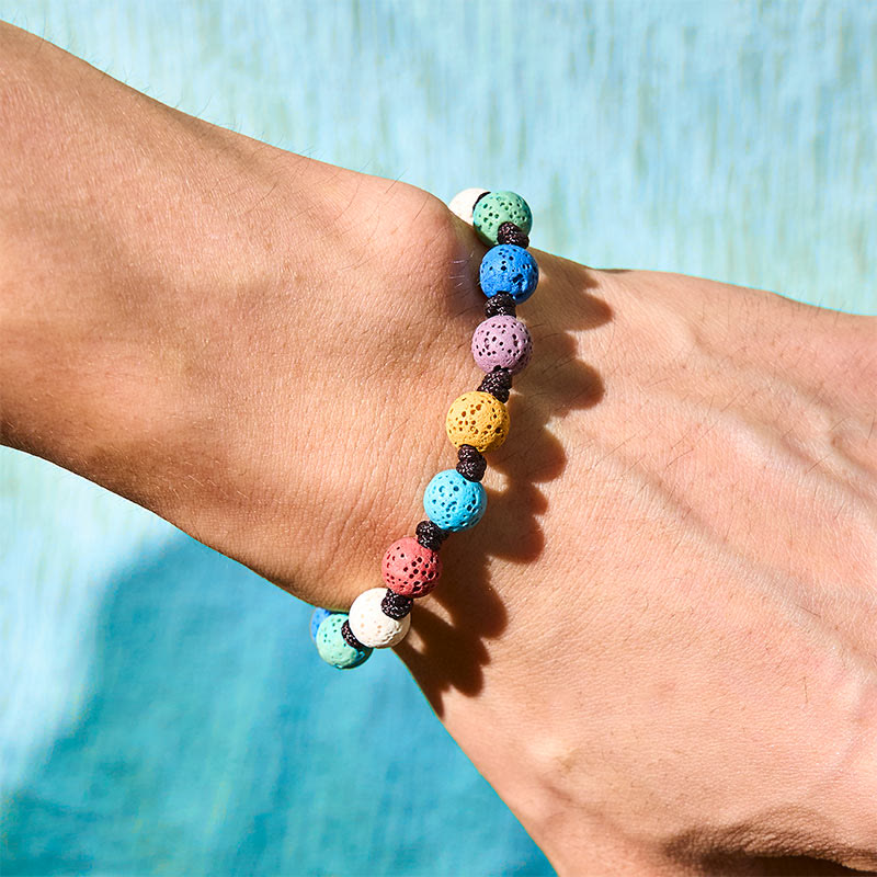Braccialetto di supporto in pietra lavica colorata Buddha Stones - image 2