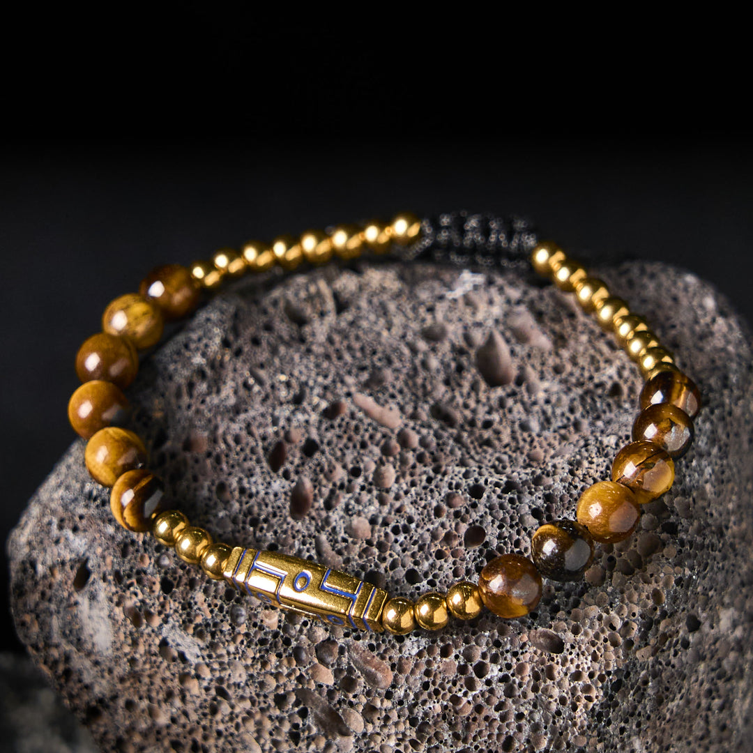 Braccialetto con perline di coraggio in occhio di tigre con motivo a osso e Buddha Stones - image 2
