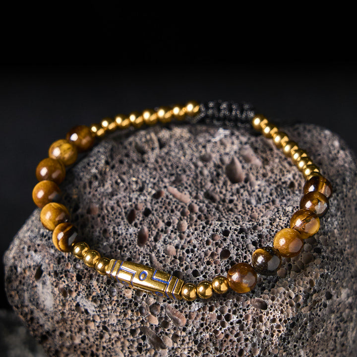 Braccialetto con perline di coraggio in occhio di tigre con motivo a osso e Buddha Stones - image 2