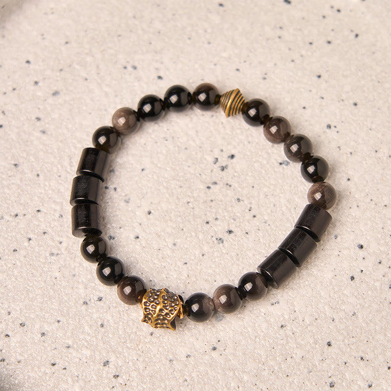 Braccialetto di protezione in ebano e ossidiana lucida color argento Buddha Stones - image 1
