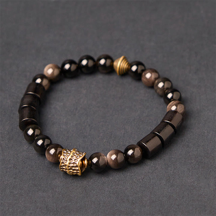 Braccialetto di protezione in ebano e ossidiana lucida color argento Buddha Stones - Ossidiana argentata e legno di ebano (circonferenza del polso: 18-20 cm) - image 0