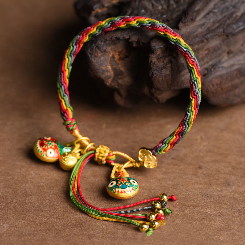Braccialetto con corda colorata intrecciata con nodo della fortuna della famiglia della bestia che ingoia Buddha Stones in Tibet - image 1