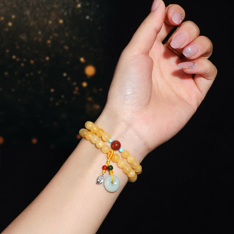 Bracciale della ricchezza con fibbia della pace a doppio giro in Buddha Stones e topazio - image 7