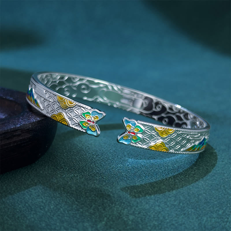Bracciale rigido regolabile aperto con motivo a farfalla in rame smaltato con motivo a sole di Buddha Stones - image 1