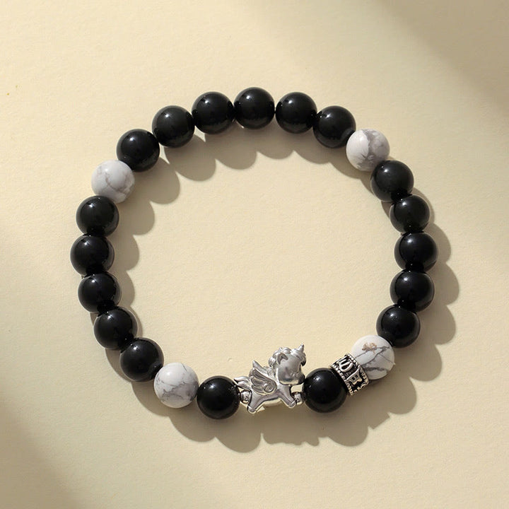 Bracciale Buddha Stones in argento sterling 999 con ossidiana nera naturale e seme di Bodhi, simbolo della forza dell'anno del cavallo - image 1