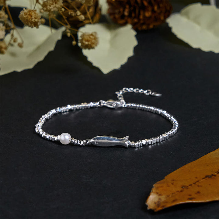 Braccialetto portafortuna con perle di pesce koi in argento placcato rame Buddha Stones - image 1