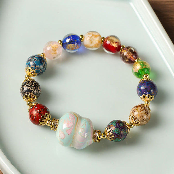 Bracciale artigianale in lacca con perline di zucca, sandalo e vetro Liuli colorato Buddha Stones - image 9