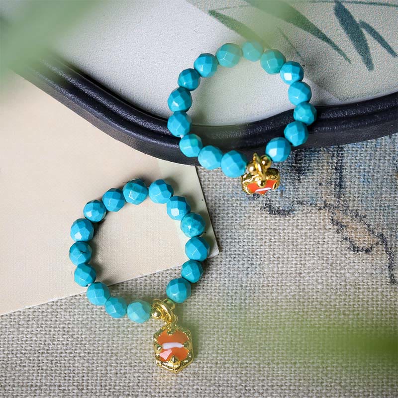 Anello elastico con perline sfaccettate in turchese ultrafine da 4 mm, motivo Buddha Stones - image 3