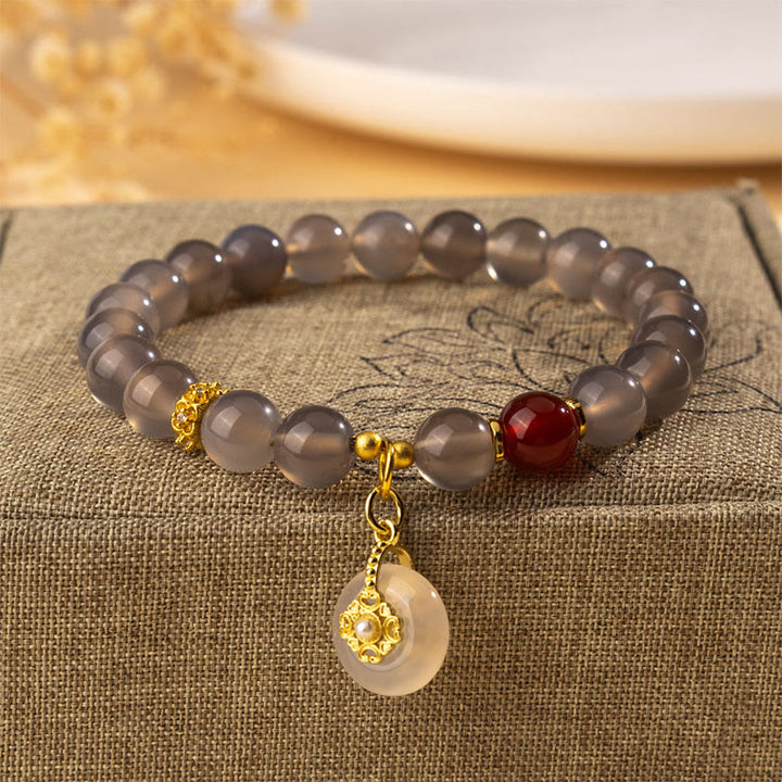 Bracciale Buddha Stones in agata grigia, agata rossa, calcedonio - Agata grigia (circonferenza del polso: 15-16 cm) - image 0