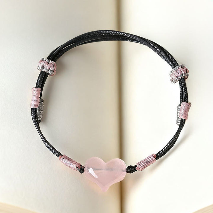 Braccialetto di calore con corda intrecciata in cristallo rosa e ciondolo a forma di cuore naturale Buddha Stones - image 3