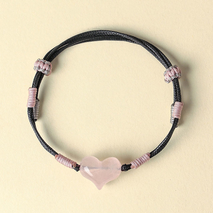 Braccialetto di calore con corda intrecciata in cristallo rosa e ciondolo a forma di cuore naturale Buddha Stones - image 2