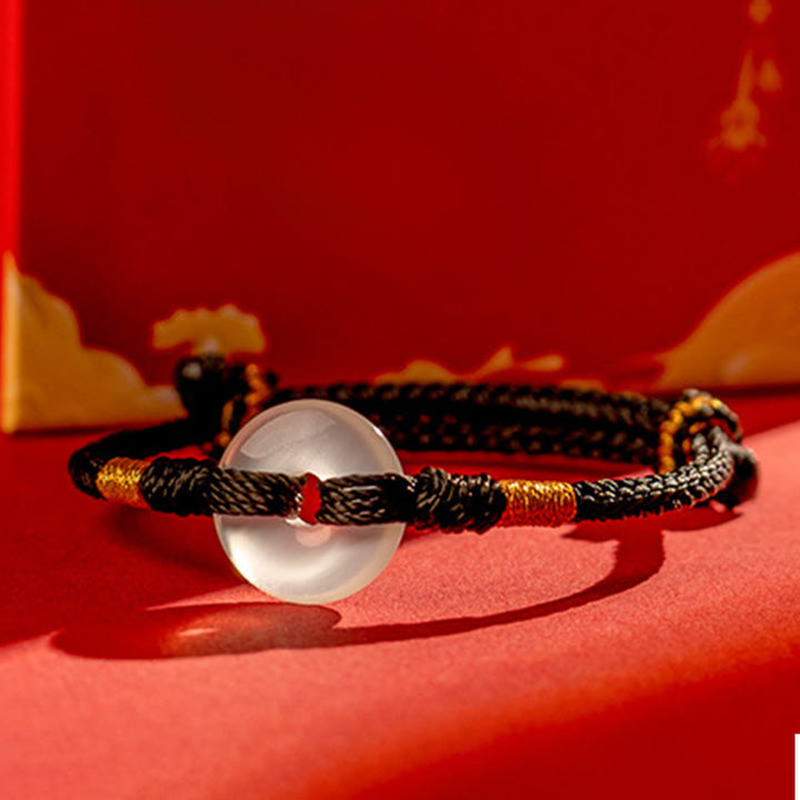 Bracciale intrecciato con fibbia della pace in calcedonio bianco Buddha Stones - image 12