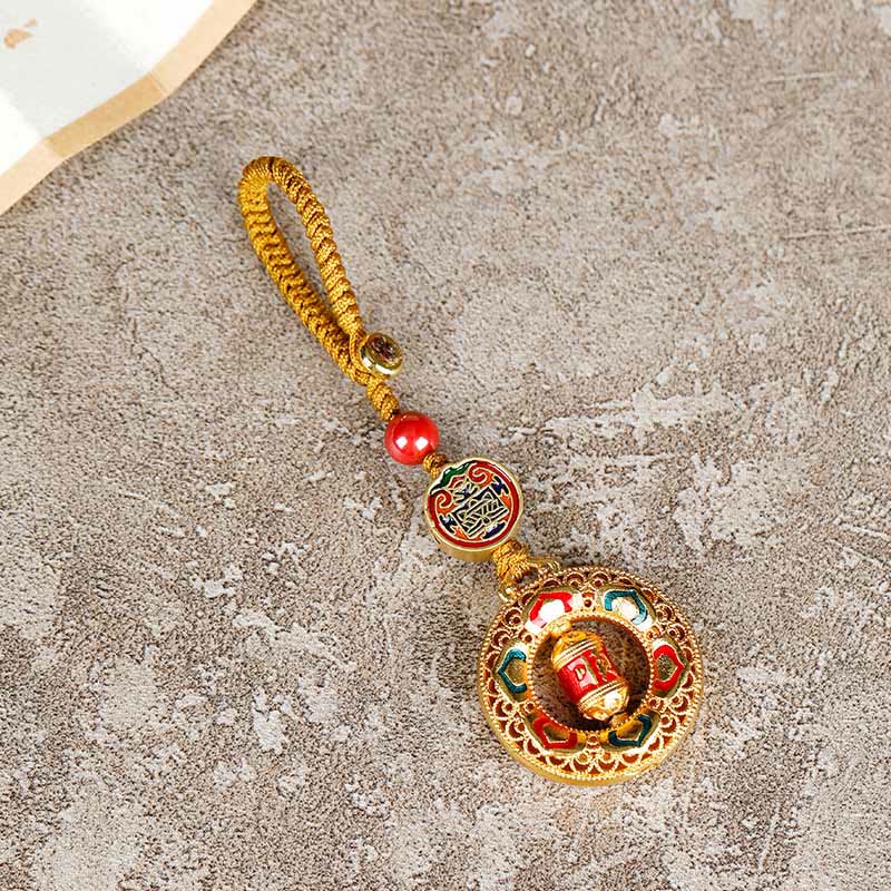 Portachiavi girevole con ruota di preghiera in rame con Buddha Stones, cinque direzioni, divinità della ricchezza - image 1