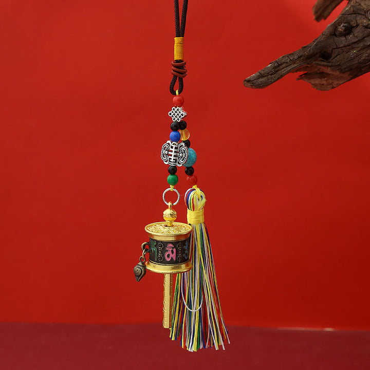 Portachiavi con ruota di preghiera Buddha Stones Om Mani Padme Hum e nappe colorate Purezza - Bronzo antico nero - image 10