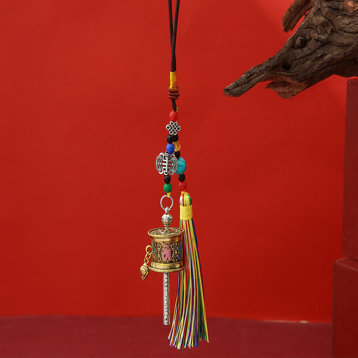 Portachiavi con ruota di preghiera Buddha Stones Om Mani Padme Hum e nappe colorate Purezza - Oro antico chiaro - image 13