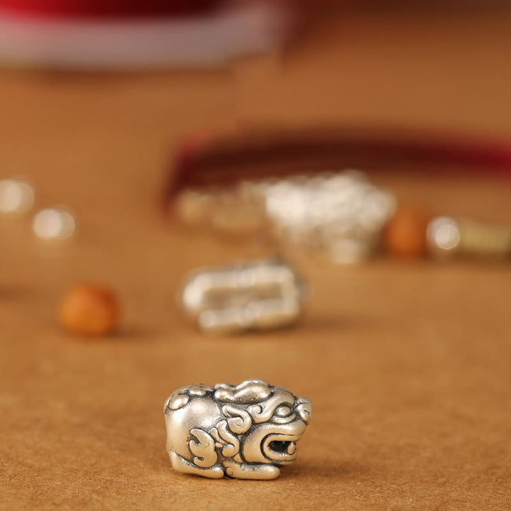 Braccialetto portafortuna intrecciato a mano con perline in legno di pesca, in argento sterling 999, con ciondolo Pixiu Buddha Stones - image 20