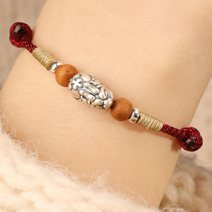 Braccialetto portafortuna intrecciato a mano con perline in legno di pesca, in argento sterling 999, con ciondolo Pixiu Buddha Stones - image 7