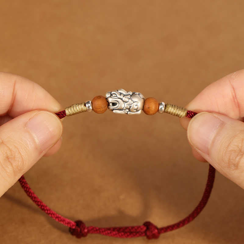 Braccialetto portafortuna intrecciato a mano con perline in legno di pesca, in argento sterling 999, con ciondolo Pixiu Buddha Stones - image 2