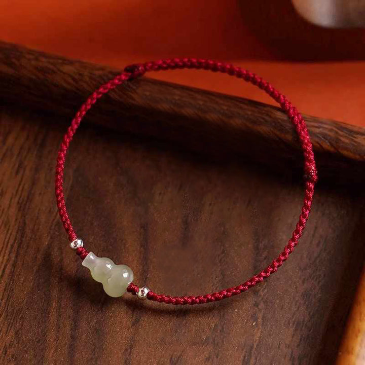 Braccialetto alla caviglia della prosperità in corda rossa Buddha Stones, zucca e giada Hetian - image 0