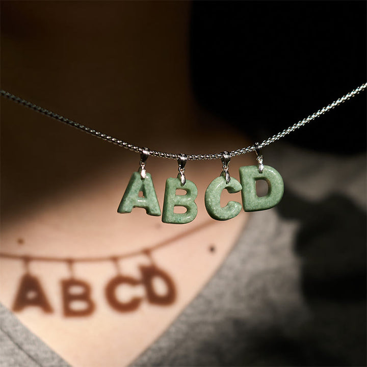 Collana con ciondolo della prosperità in acciaio al titanio con lettera AZ naturale Buddha Stones - image 41