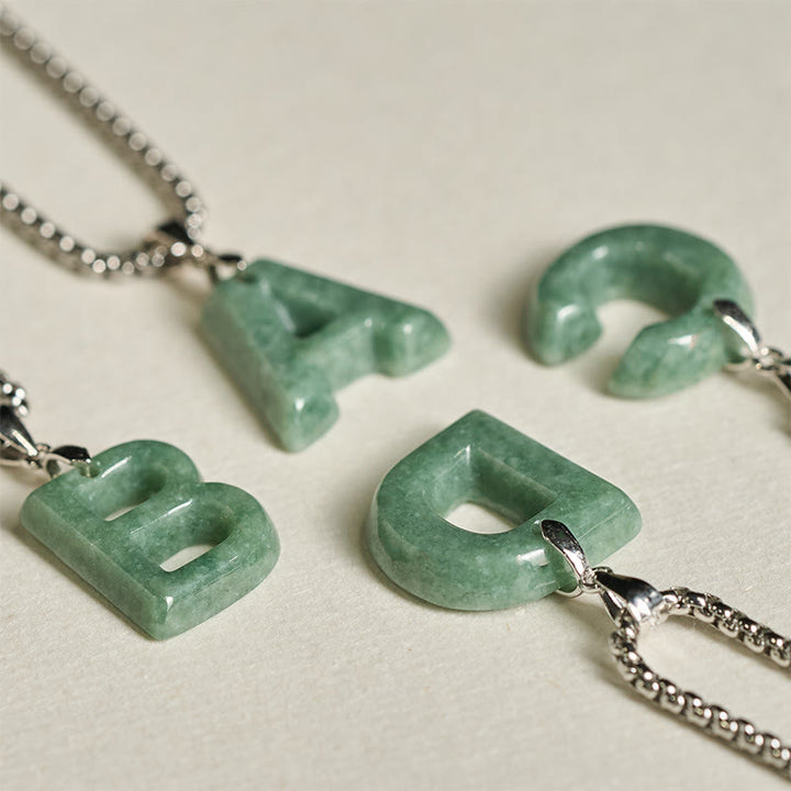 Collana con ciondolo della prosperità in acciaio al titanio con lettera AZ naturale Buddha Stones - image 37