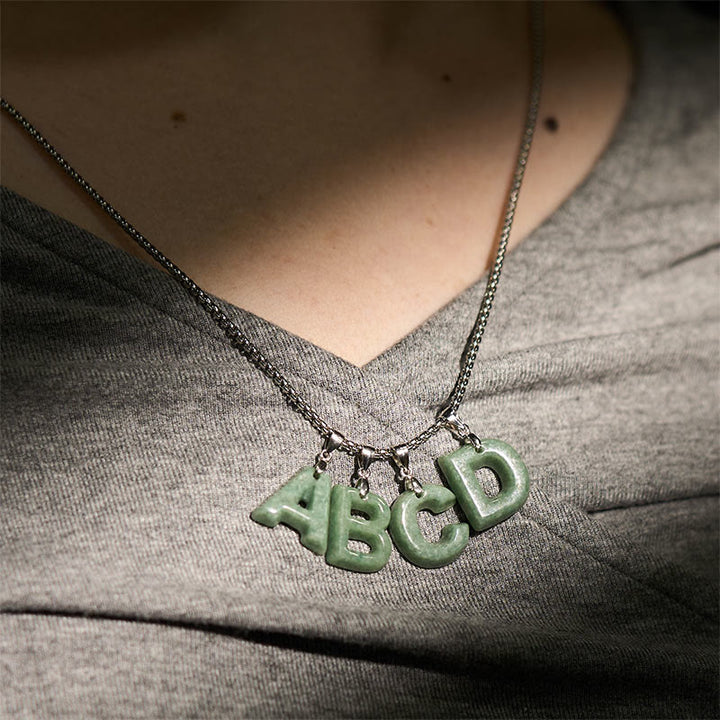 Collana con ciondolo della prosperità in acciaio al titanio con lettera AZ naturale Buddha Stones - image 42