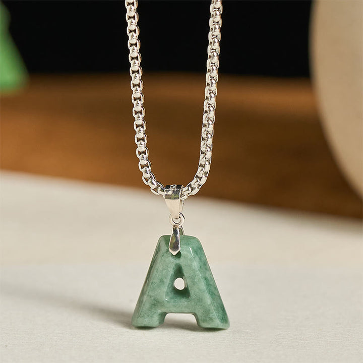 Collana con ciondolo della prosperità in acciaio al titanio con lettera AZ naturale Buddha Stones - UN - image 1