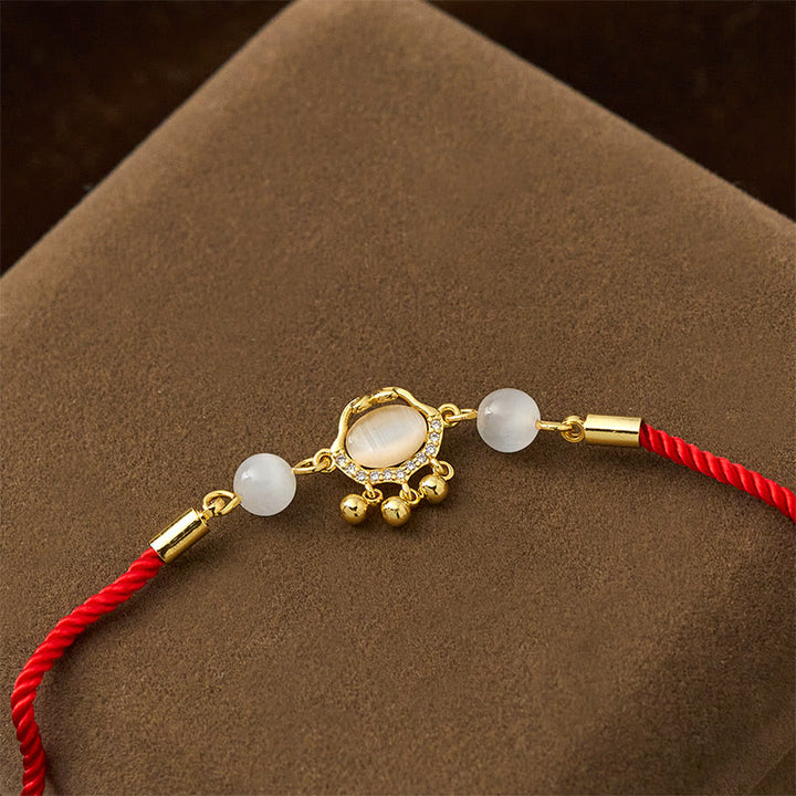Braccialetto di protezione in rame placcato oro con ciondolo a forma di lucchetto cinese Buddha Stones filo rosso occhio di gatto - image 3