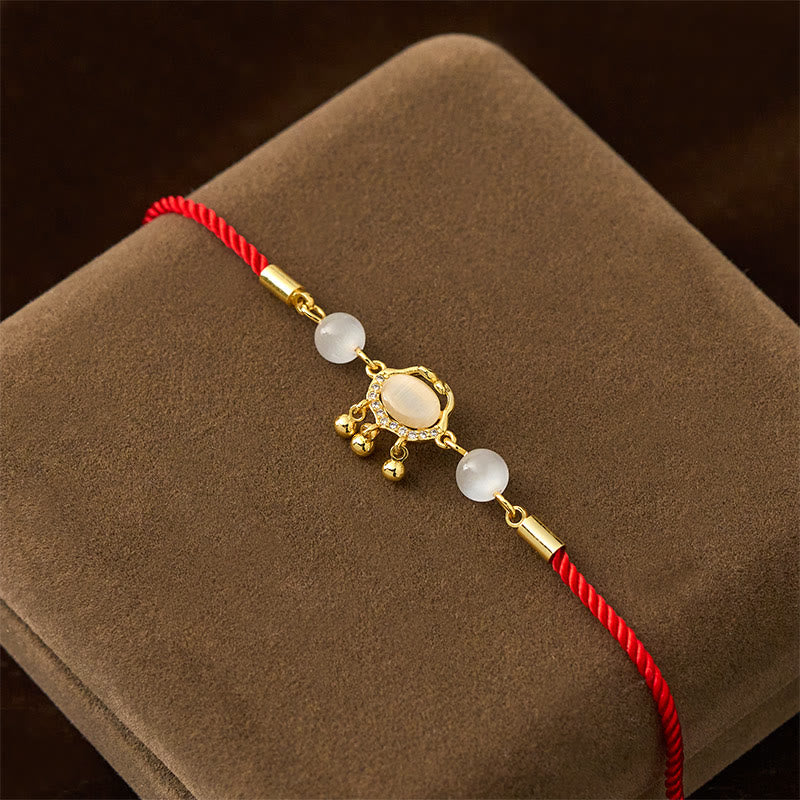 Braccialetto di protezione in rame placcato oro con ciondolo a forma di lucchetto cinese Buddha Stones filo rosso occhio di gatto - image 2