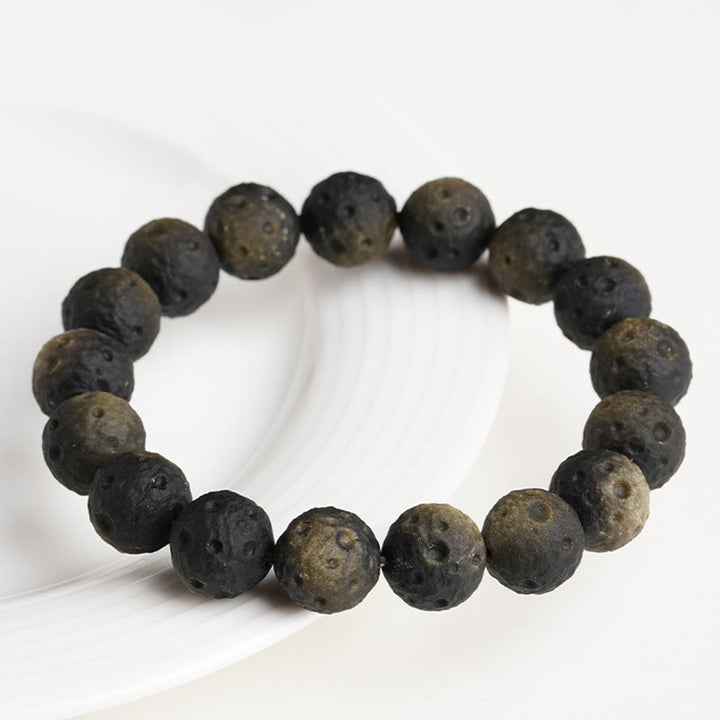 Braccialetto di protezione con perle rotonde in ossidiana dorata e argento naturale Buddha Stones - image 9