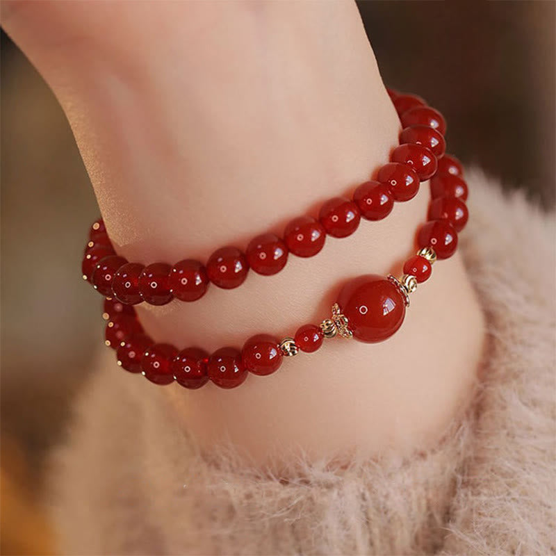Bracciale Buddha Stones con doppio giro di perline di agata rossa per l'accettazione di sé e la fiducia in se stessi - image 0