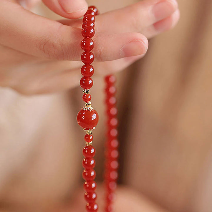Bracciale Buddha Stones con doppio giro di perline di agata rossa per l'accettazione di sé e la fiducia in se stessi - image 10