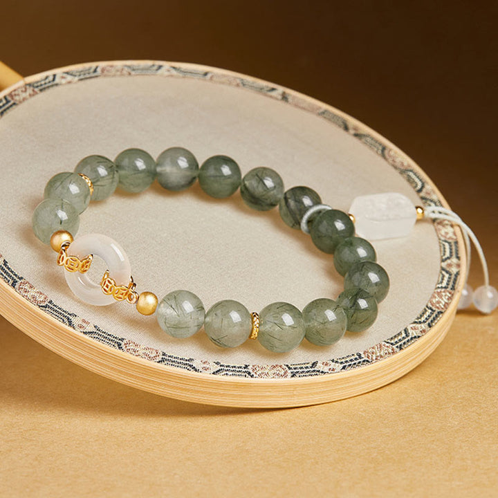 Bracciale Buddha Stones in argento sterling 925, quarzo rutilato verde, calcedonio bianco, fibbia della pace e coraggio - image 2