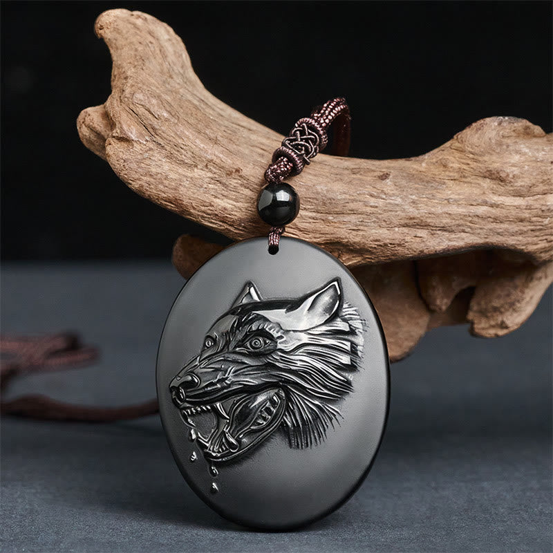 Collana con ciondolo a forma di testa di lupo in ossidiana nera naturale Buddha Stones e forza - image 1