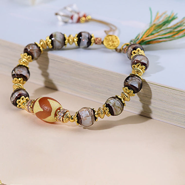 Braccialetto delle benedizioni con perline di vetro Dzi Buddha Stones Liuli - image 9
