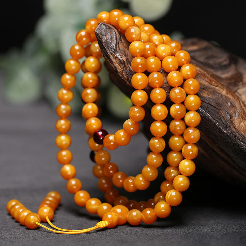 Mala con perline rotonde in ambra tibetana Buddha Stones - 10 millimetri - image 0