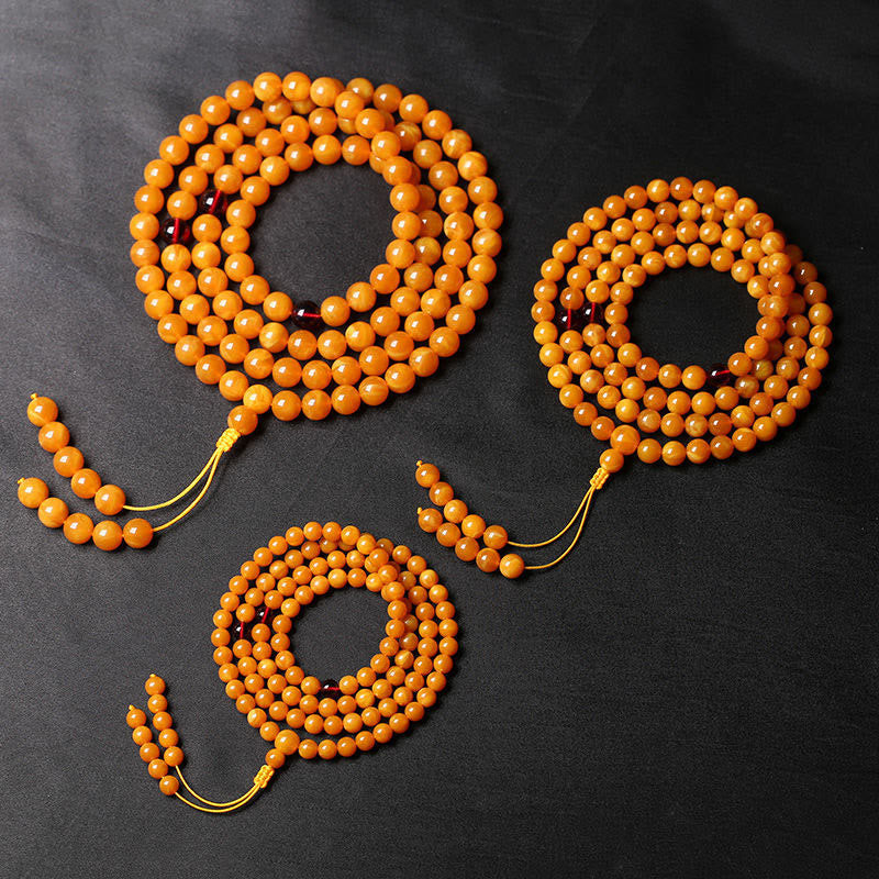 Mala con perline rotonde in ambra tibetana Buddha Stones - image 1